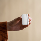 person holding door sensor