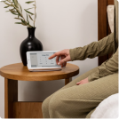 person using panel on bedside